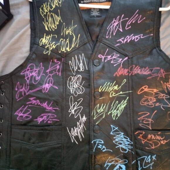 jacket signed by five band members